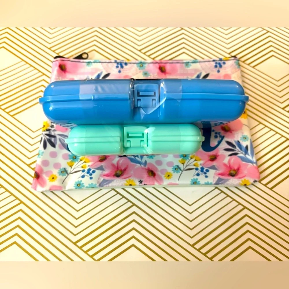 Two Small size cosmetic cases and zipper bag